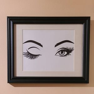 Framed winking eye wall decor 12"x16"